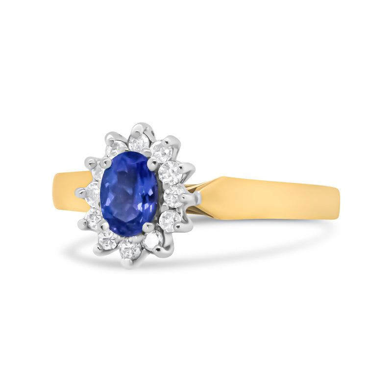 Bids.com 14K Yellow Gold 1/5 Cttw Round Diamond and 6x4mm Oval Blue Tanzanite Halo Ring (H-I Color, I1-I2 Clarity) - Size 7.75 Rings