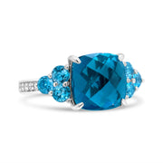 Bids.com 18K White Gold 10mm Cushion Shaped Blue Topaz and 1/6 Cttw Diamond 3 Stone Style Ring (F-G Color, VS1-VS2 Clarity) - Ring Size 6.5 Rings