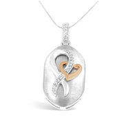 Bids.com 10k Rose Gold and Sterling Silver 1/10ct TDW Round Cut Diamond Interlocked Heart and Ribbon Pendant Necklace (H-I, I1-I2) Necklaces