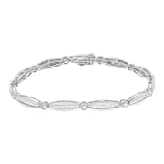 Bids.com 14K White Gold 1-1/2 Cttw Round Brilliant-Cut & Baguette Cut Diamond Bezel and Tapered Link 7" Tennis Bracelet (H-I Color, I1-I2 Clarity) Bracelets