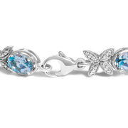 Bids.com .925 Sterling Silver Oval Blue Topaz Diamond Butterfly Link Bracelet (I-J Color, I1-I2 Clarity) - Size 7" Inches Bracelets