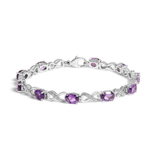 Bids.com .925 Sterling Silver Oval Purple Amethyst and Diamond Infinity Link Bracelet (I-J Color, I1-I2 Clarity) - 7" Inches Bracelets