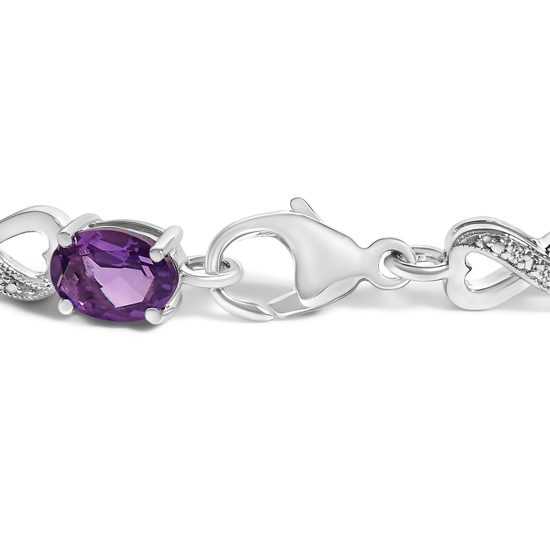 Bids.com .925 Sterling Silver Oval Purple Amethyst and Diamond Infinity Link Bracelet (I-J Color, I1-I2 Clarity) - 7" Inches Bracelets