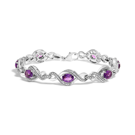 Bids.com .925 Sterling Silver 1/10 Cttw Natural Round Diamond and 7X5MM Oval Amethyst Cross Tennis Bracelet (I-J Color, I1-I2 Clarity) - 7" Bracelets