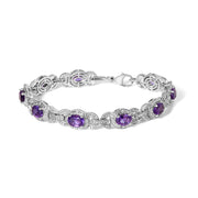 Bids.com Sterling Silver Oval Purple Amethyst and Diamond Interlocking Halo Link Bracelet Bracelets