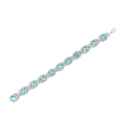 Bids.com .925 Sterling Silver 7x7 mm Cushion Cut Blue Topaz and 1/10 Ctw Single Cut Diamond Square Shape Tennis Bracelet (I-J Color, I1-I2 Clarity) - 7" Bracelets