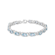 Bids.com .925 Sterling Silver 16.0 Cttw Oval Blue Topaz and Diamond Accent Tennis X Link Bracelet (I-J Color, I1-I2 Clarity) - Size 7" Inch Bracelets
