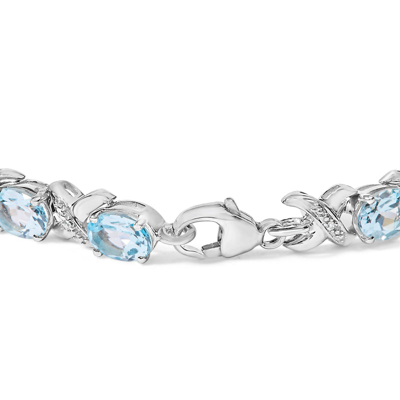 Bids.com .925 Sterling Silver 16.0 Cttw Oval Blue Topaz and Diamond Accent Tennis X Link Bracelet (I-J Color, I1-I2 Clarity) - Size 7" Inch Bracelets