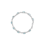 Bids.com .925 Sterling Silver 7x7 mm Cushion Cut Blue Topaz and 1/20 cttw Round Cut Diamond Fashion Tennis Bracelet (I-J Color, I1-I2 Clarity) - 7" Bracelets