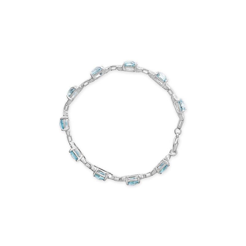 Bids.com .925 Sterling Silver 7x7 mm Cushion Cut Blue Topaz and 1/20 cttw Round Cut Diamond Fashion Tennis Bracelet (I-J Color, I1-I2 Clarity) - 7" Bracelets