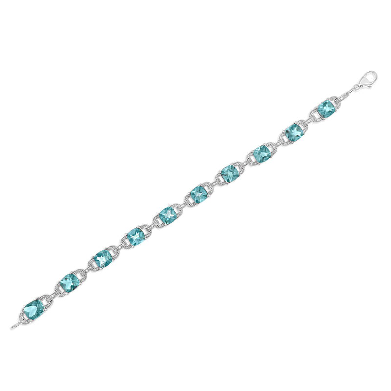 Bids.com .925 Sterling Silver 7x7 mm Cushion Cut Blue Topaz and 1/20 cttw Round Cut Diamond Fashion Tennis Bracelet (I-J Color, I1-I2 Clarity) - 7" Bracelets