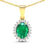 Bids.com 1.13 Carat Genuine Zambian Emerald and White Diamond 14K Yellow Gold Pendant Pendants
