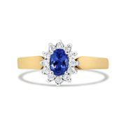 Bids.com 14K Yellow Gold 1/5 Cttw Round Diamond and 6x4mm Oval Blue Tanzanite Halo Ring (H-I Color, I1-I2 Clarity) - Size 7.75 Rings