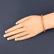 Bids.com 12.33 Carat Genuine Orange Sapphire and White Diamond 14K Yellow Gold Bracelet Bracelets