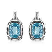 Bids.com .925 Sterling Silver 14x10MM Cushion Cut Blue Topaz Gemstone and Diamond Accent Dangle Earring (I-J Color, I1-I2 Clarity) Earrings