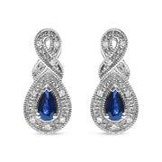 Bids.com .925 Sterling Silver 4.5 x 3mm Pear Sapphire Gemstone and Diamond Accent Infinity Drop Stud Earrings (H-I Color, SI1-SI2 Clarity) Earrings