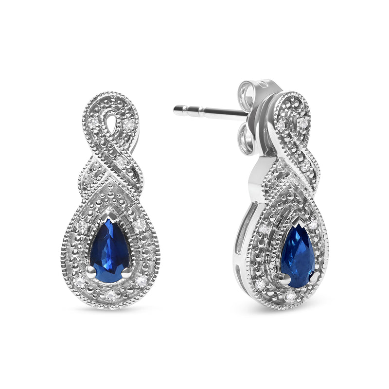 Bids.com .925 Sterling Silver 4.5 x 3mm Pear Sapphire Gemstone and Diamond Accent Infinity Drop Stud Earrings (H-I Color, SI1-SI2 Clarity) Earrings