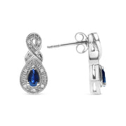 Bids.com .925 Sterling Silver 4.5 x 3mm Pear Sapphire Gemstone and Diamond Accent Infinity Drop Stud Earrings (H-I Color, SI1-SI2 Clarity) Earrings