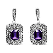 Bids.com .925 Sterling Silver Diamond Accent and 7x5mm Purple Amethyst Stud Earrings (I-J Color, I2-I3 Clarity) Earrings