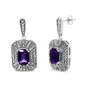 Bids.com .925 Sterling Silver Diamond Accent and 7x5mm Purple Amethyst Stud Earrings (I-J Color, I2-I3 Clarity) Earrings
