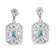 Bids.com .925 Sterling Silver 7x5MM Emerald Shape Blue Topaz and Diamond Accent Art Deco Halo Style Drop and Dangle Earrings (I-J Color, I1-I2 Clarity) Earrings