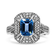 Bids.com .925 Sterling Silver Diamond Accent and 8X6 mm Emerald-Shape Blue Topaz Ring (I-J Color, I2-I3 Clarity) - Ring Size 7 Rings