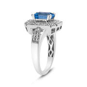 Bids.com .925 Sterling Silver Diamond Accent and 8X6 mm Emerald-Shape Blue Topaz Ring (I-J Color, I2-I3 Clarity) - Ring Size 7 Rings