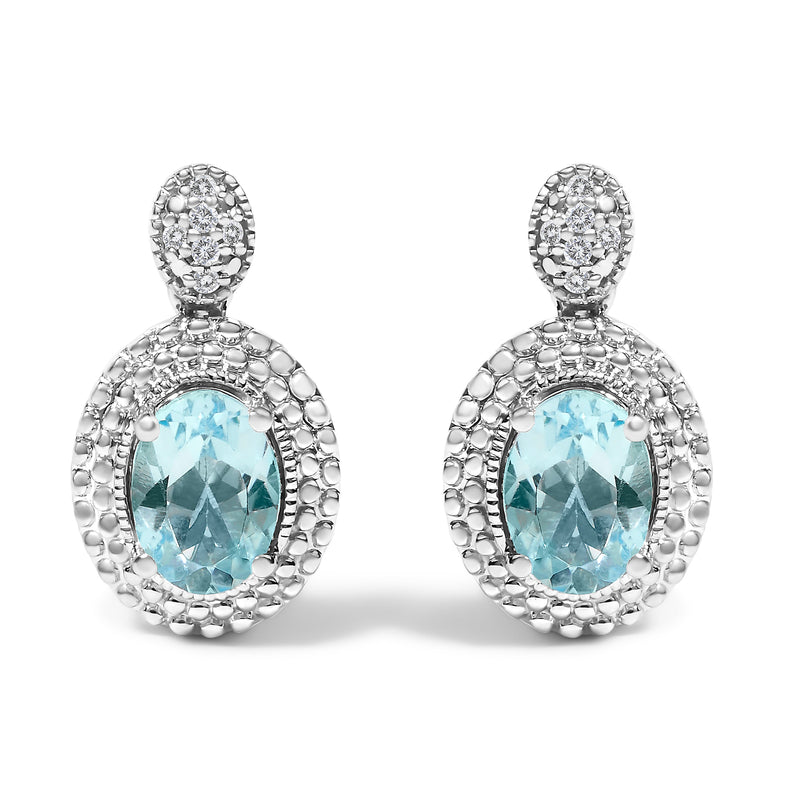 Bids.com .925 Sterling Silver Diamond Accent and  Oval Blue Topaz with Beaded Halo Drop Stud Earrings (I-J color, I1-I2 Clarity) Earrings
