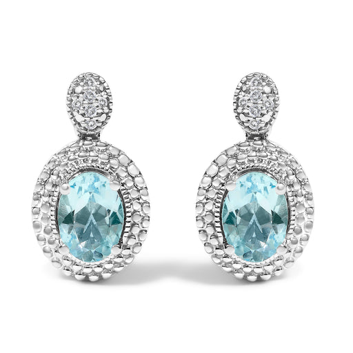 Bids.com .925 Sterling Silver Diamond Accent and  Oval Blue Topaz with Beaded Halo Drop Stud Earrings (I-J color, I1-I2 Clarity) Earrings