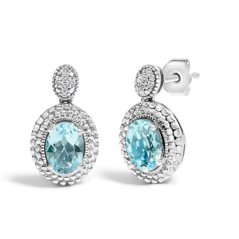 Bids.com .925 Sterling Silver Diamond Accent and  Oval Blue Topaz with Beaded Halo Drop Stud Earrings (I-J color, I1-I2 Clarity) Earrings