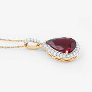 Bids.com 3.29 Carat Genuine Rhodolite and White Diamond 14K Yellow Gold Pendant Pendants