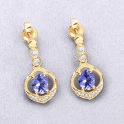 Bids.com 0.76 Carat Genuine Tanzanite and White Diamond 14K Yellow Gold Earrings Earrings