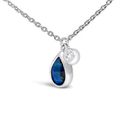 Bids.com 14K White Gold 6x4mm Pear Blue Sapphire and Diamond Accent Charm Pendant Necklace - 18" Inches Necklaces