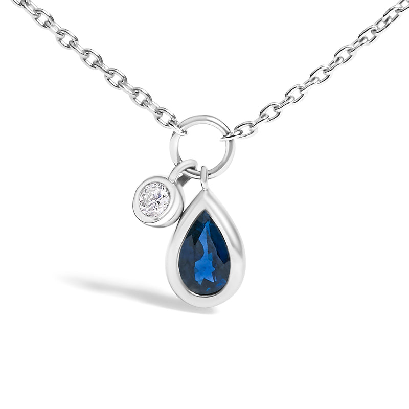 Bids.com 10K White Gold 6x4 mm Pear Blue Sapphire and Diamond  Accent Charm Pendant Necklace - 18" Inches Necklaces