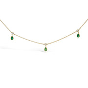 Bids.com 10K Yellow Gold Dangling 5x3 mm Green Emerald and Diamond Station Necklace - 18" Inches Necklaces