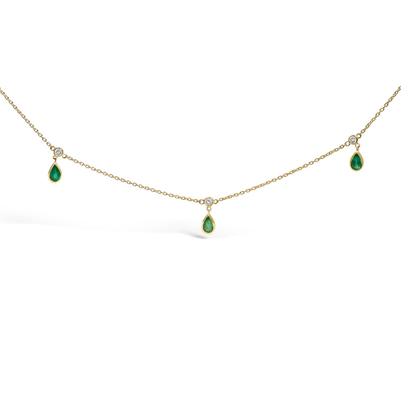 Bids.com 10K Yellow Gold Dangling 5x3 mm Green Emerald and Diamond Station Necklace - 18" Inches Necklaces