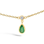 Bids.com 10K Yellow Gold Dangling 5x3 mm Green Emerald and Diamond Station Necklace - 18" Inches Necklaces