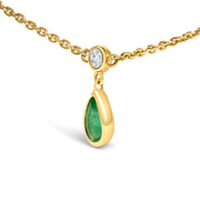 Bids.com 10K Yellow Gold Dangling 5x3 mm Green Emerald and Diamond Station Necklace - 18" Inches Necklaces
