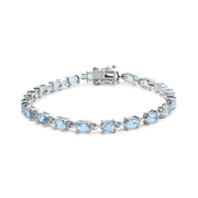 Bids.com .925 Sterling Silver 11.0 Cttw Oval Shaped Created Light Blue Topaz Link Bracelet - 7 inch Bracelets