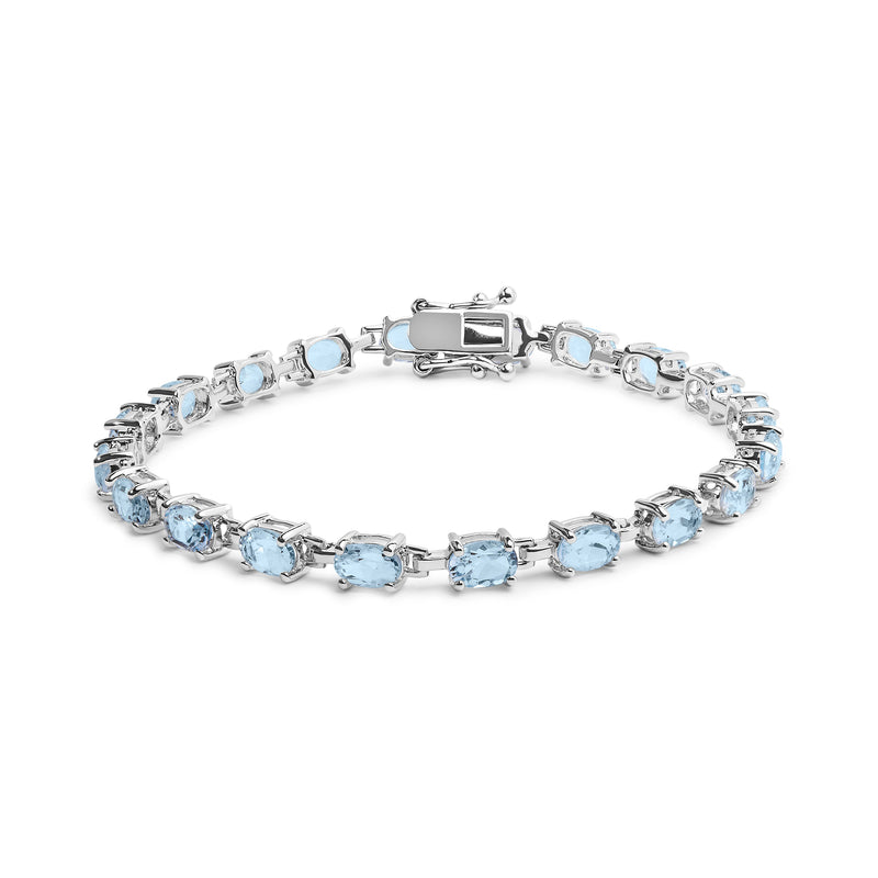 Bids.com .925 Sterling Silver 11.0 Cttw Oval Shaped Created Light Blue Topaz Link Bracelet - 7 inch Bracelets