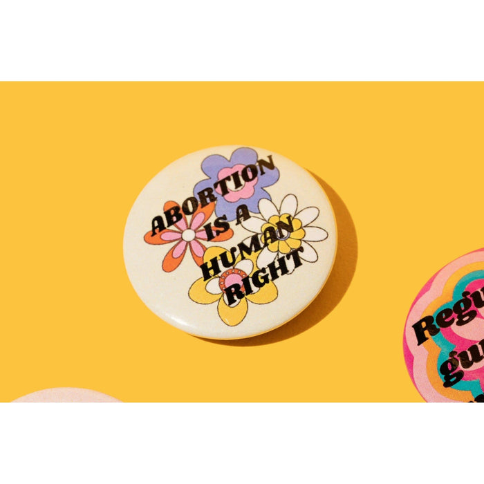 The Bullish Store - Abortion Is A Human Right 1.25" Button In Groovy Flower Design