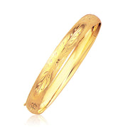 Bids.com Classic Floral Carved Bangle in 14k Yellow Gold (8.0mm) Bracelets