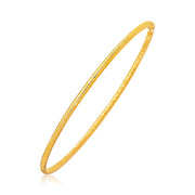 Bids.com 14k Yellow Gold Thin Textured Stackable Bangle Bracelets