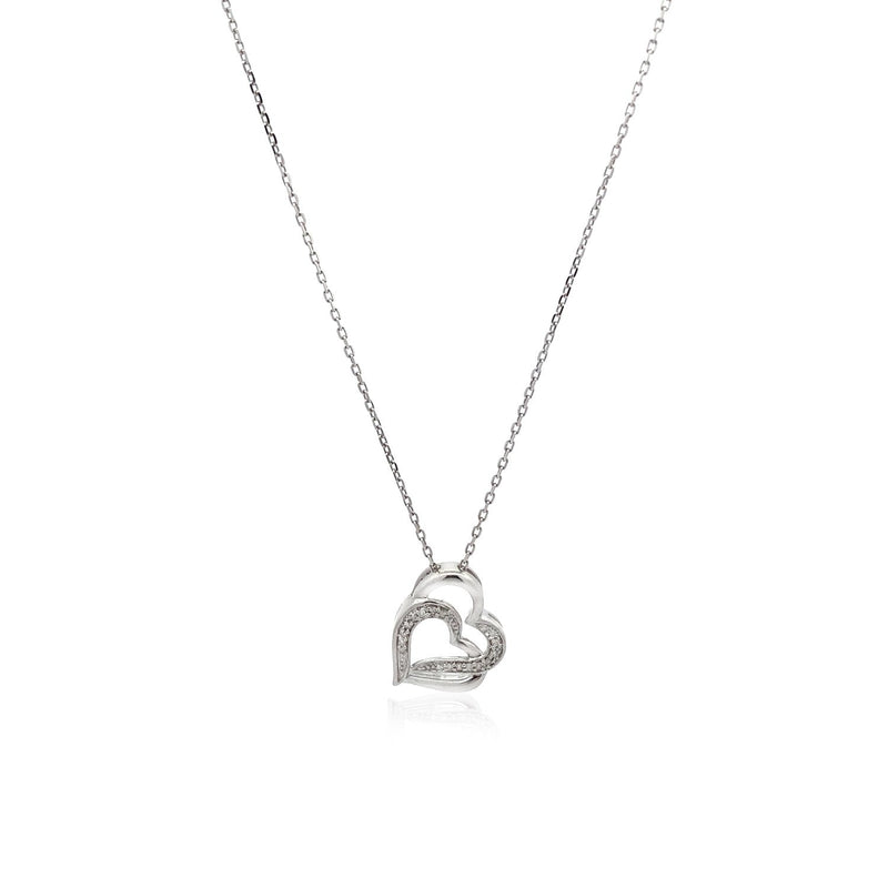Bids.com Sterling Silver Dual Heart Motif Pendant with Diamonds (.06 cttw) Pendants