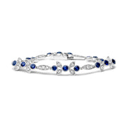 Bids.com 18K White Gold 1 3/4 Cttw Diamond and 3x3mm Round Blue Sapphire Gemstone Floral Link Bracelet (G-H Color, SI1-SI2 Clarity) - Size 7" Bracelets