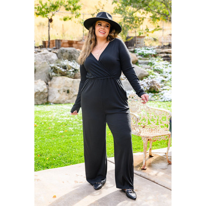 Onward & Upward Faux Wrap Jumpsuit In Black