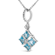 Bids.com Sterling Silver Blue Topaz and White Sapphire Square Motif Pendant Necklace 18 Inch Necklaces