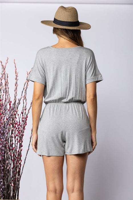 SOFT SURPLICE W/ SIDE POCKETS ROMPER by Stylish Wholesale Inc