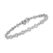 Bids.com 10K White Gold 4.0 cttw Brilliant Round-cut and Baguette Diamond Floral Cluster Link Bracelet (I-J Clarity, I1-I2 Color) - Size 7" Bracelets