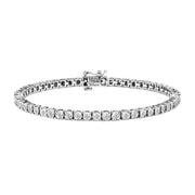 Bids.com .925 Sterling Silver 1.0 Cttw Miracle-Set Diamond Round Faceted Bezel Tennis Bracelet (I-J Color, I3 Clarity) - 7" Bracelets